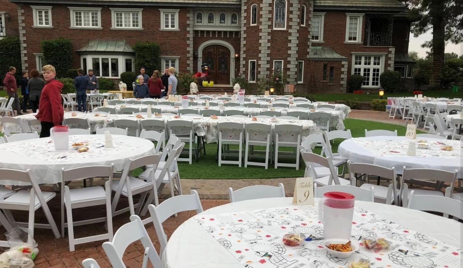 Tables set for Kid Connection Thanksgiving dinner at The Lavender Farm at Chateau de Vie